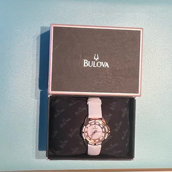 Bulova ladies rose gold with diamond accent white leather watch. - Picture 7 of 7